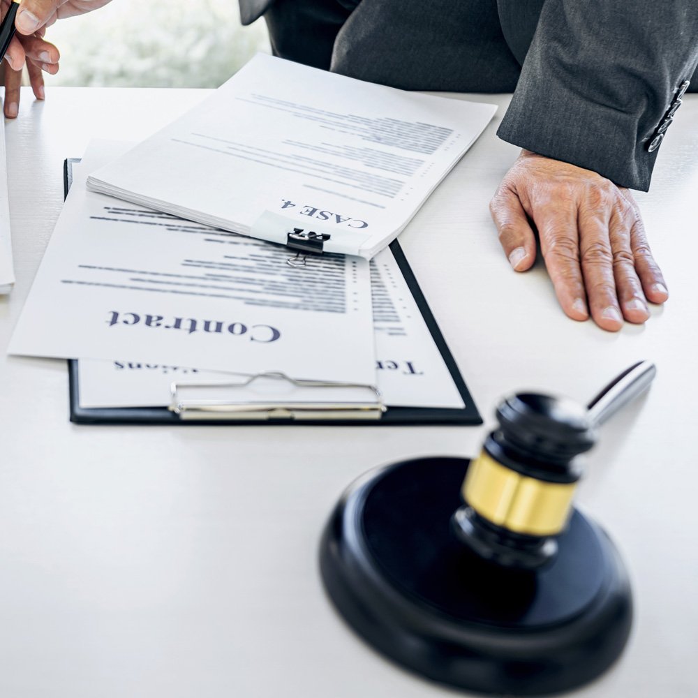 A Judge's Gavel and a Bail Bond Contract in Spartanburg, SC. These items tell a small story about a bail bond in Spartanburg, SC.